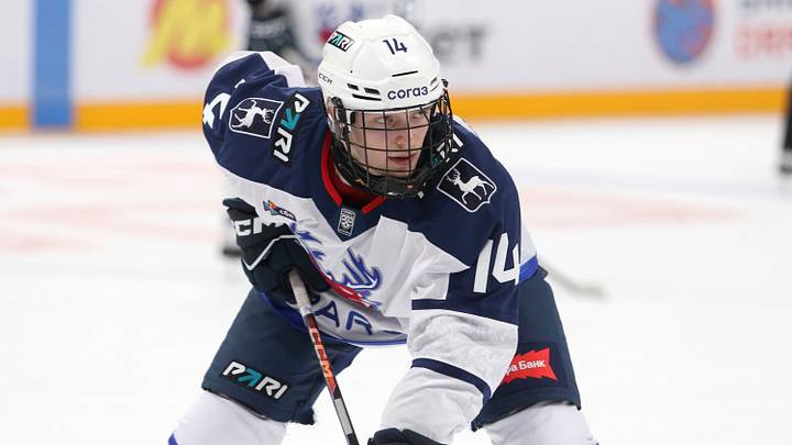 Viktor Fyodorov (14) of Torpedo Hockey Club seen in action during the Hockey match, Kontinental Hockey League