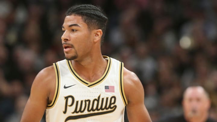 Purdue Boilermakers guard C.J. Cox (0) drives to the basket Purdue Boilermakers guard C.J. Cox (0) drives to the basket