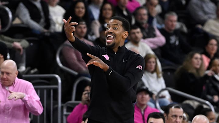 Feb 25, 2026; Providence, Rhode Island, USA; Providence Friars head coach Kim English calls out during the first half against the Xavier Musketeers at Amica Mutual Pavilion. Mandatory Credit: Eric Canha-Imagn Images
