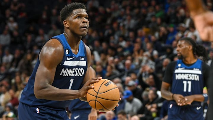 Nov 30, 2022; Minneapolis, Minnesota, USA;  Minnesota Timberwolves forward Anthony Edwards (1) shoots a free-throw against the Memphis Grizzlies during the second quarter at Target Center. Mandatory Credit: Nick Wosika-Imagn Images

