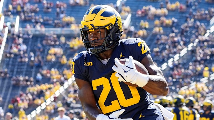 Michigan running back Kalel Mullings (20) warms up before the USC game at Michigan Stadium in Ann Arbor on Saturday, Sept. 21, 2024.