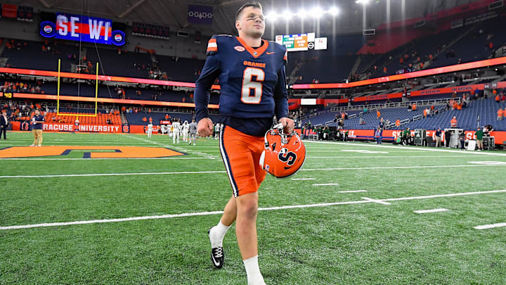 Aug 31, 2024; Syracuse, New York, USA; Syracuse Orange quarterback Kyle McCord (6) jogs on the field following a game against the Ohio Bobcats at the JMA Wireless Dome. Mandatory Credit: Rich Barnes-Imagn Images