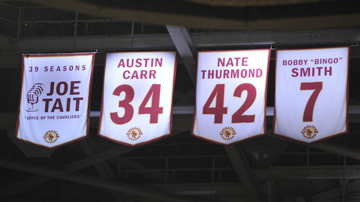 Jan 3, 2012; Cleveland, OH, USA; Banners of Cleveland Cavaliers former broadcaster Joe Tait (not pictured), former players Austin Carr (not pictured), Nate Thurmond (not pictured) and Bobby Smith (not pictured) hang at Quicken Loans Arena. Mandatory Credit: David Richard-Imagn Images