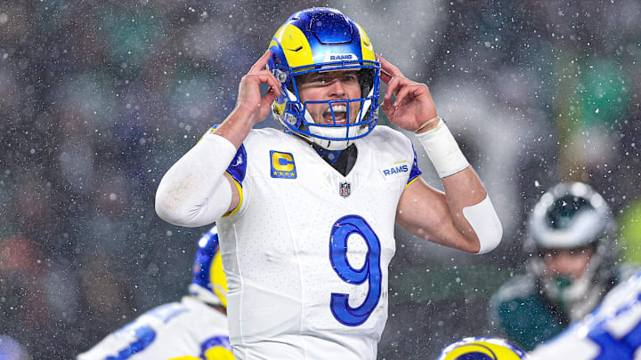 Jan 19, 2025; Philadelphia, Pennsylvania, USA; Los Angeles Rams quarterback Matthew Stafford (9) calls a play at the one of scrimmage against the Philadelphia Eagles in a 2025 NFC divisional round game at Lincoln Financial Field. Mandatory Credit: Bill Streicher-Imagn Images