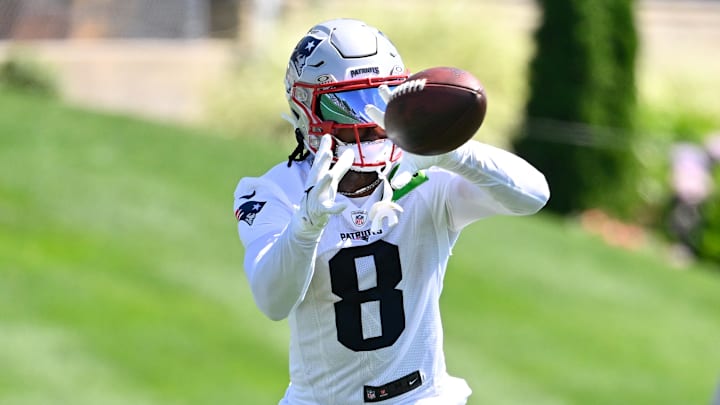 Jul 23, 2025; Foxborough, MA, USA; New England Patriots wide receiver Stefon Diggs (8) makes a catch during training camp at Gillette Stadium. Mandatory Credit: Eric Canha-Imagn Images