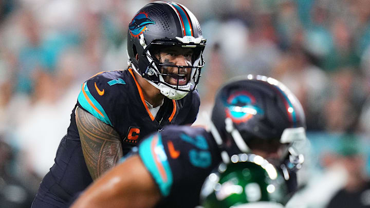 Miami Dolphins quarterback Tua Tagovailoa (1) reacts against the New York Jets during the first half at Hard Rock Stadium.