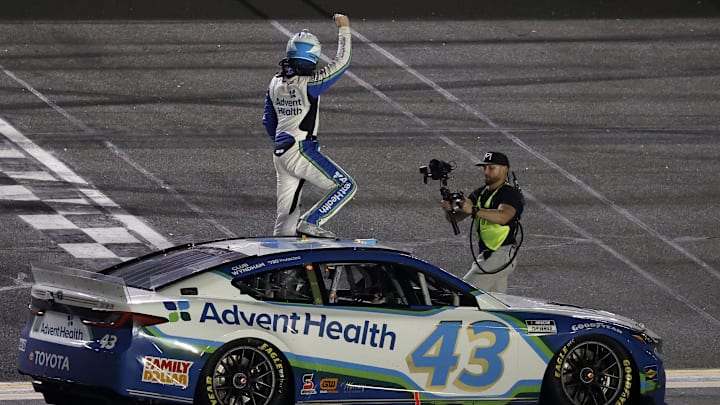 Feb 13, 2025; Daytona Beach, Florida, USA; NASCAR Cup Series driver Erik Jones (43) reacts after winning Duel 2 but after video replay the win was awarded to NASCAR Cup Series driver Austin Cindric (not pictured) at Daytona International Speedway. Mandatory Credit: Peter Casey-Imagn Images Feb 13, 2025; Daytona Beach, Florida, USA; NASCAR Cup Series driver Erik Jones (43) reacts after winning Duel 2 but after video replay the win was awarded to NASCAR Cup Series driver Austin Cindric (not pictured) at Daytona International Speedway. Mandatory Credit: Peter Casey-Imagn Images