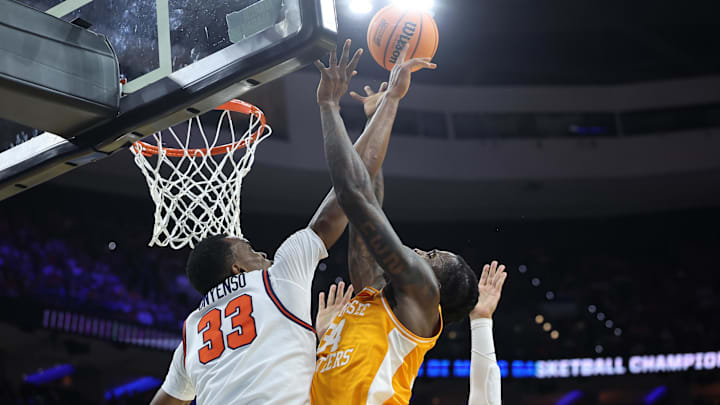 Tennessee Volunteers center Felix Okpara and Virginia Cavaliers center Ugonna Onyenso 