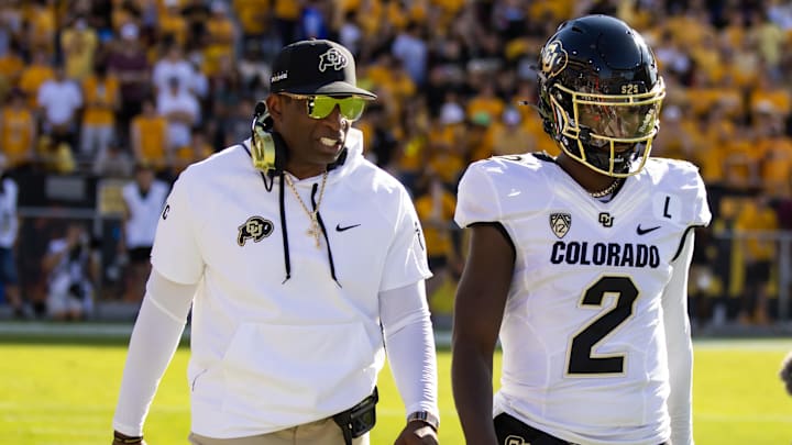 Oct 7, 2023; Tempe, Arizona, USA; Colorado Buffaloes head coach Deion Sanders with son and