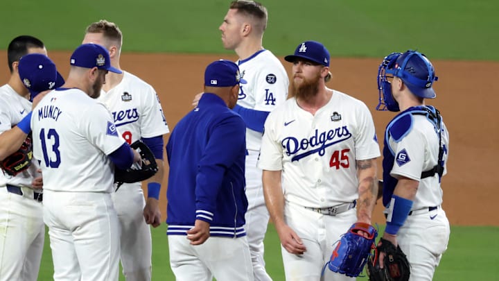 Oct 25, 2024; Los Angeles, California, USA; Los Angeles Dodgers manager Dave Roberts (30) relieves pitcher Michael Kopech (45) in the ninth inning against the New York Yankees during game one of the 2024 MLB World Series at Dodger Stadium. Mandatory Credit: Kiyoshi Mio-Imagn Images Oct 25, 2024; Los Angeles, California, USA; Los Angeles Dodgers manager Dave Roberts (30) relieves pitcher Michael Kopech (45) in the ninth inning against the New York Yankees during game one of the 2024 MLB World Series at Dodger Stadium. Mandatory Credit: Kiyoshi Mio-Imagn Images
