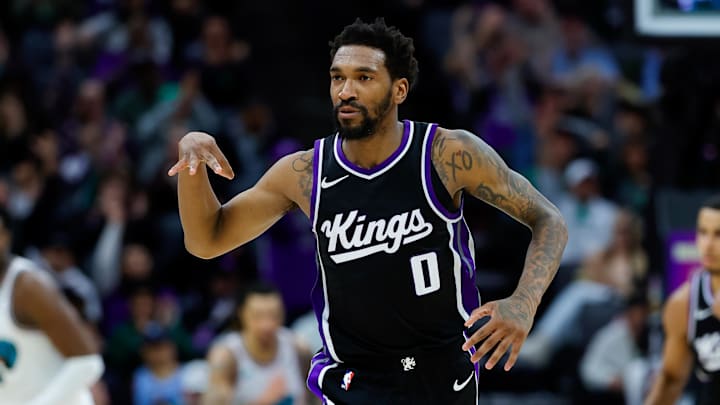 Mar 17, 2025; Sacramento, California, USA; Sacramento Kings guard Malik Monk (0) celebrates after scoring a basket against the Memphis Grizzlies during the fourth quarter at Golden 1 Center. Mandatory Credit: Sergio Estrada-Imagn Images Mar 17, 2025; Sacramento, California, USA; Sacramento Kings guard Malik Monk (0) celebrates after scoring a basket against the Memphis Grizzlies during the fourth quarter at Golden 1 Center. Mandatory Credit: Sergio Estrada-Imagn Images