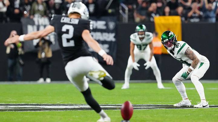 Nov 12, 2023; Paradise, Nevada, USA; New York Jets safety Ashtyn Davis (21) awaits a kick off by Las Vegas Raiders place kicker Daniel Carlson (2) during the first quarter at Allegiant Stadium. Mandatory Credit: Stephen R. Sylvanie-USA TODAY Sports