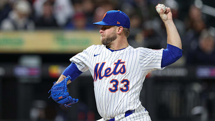 Apr 17, 2025; New York City, New York, USA; New York Mets relief pitcher A.J. Minter (33) delivers a pitch during the eighth inning against the St. Louis Cardinals at Citi Field. Mandatory Credit: Vincent Carchietta-Imagn Images