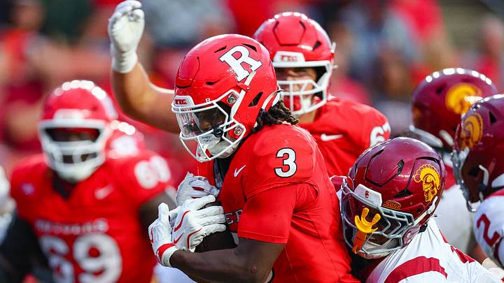 Sep 19, 2026; Piscataway, New Jersey, USA; Rutgers Scarlet Knights running back Antwan Raymond (3) is tackled by USC Trojans linebacker Desman Stephens II (8) during the second half at SHI Stadium. Mandatory Credit: Vincent Carchietta-Imagn Images Sep 19, 2026; Piscataway, New Jersey, USA; Rutgers Scarlet Knights running back Antwan Raymond (3) is tackled by USC Trojans linebacker Desman Stephens II (8) during the second half at SHI Stadium. Mandatory Credit: Vincent Carchietta-Imagn Images