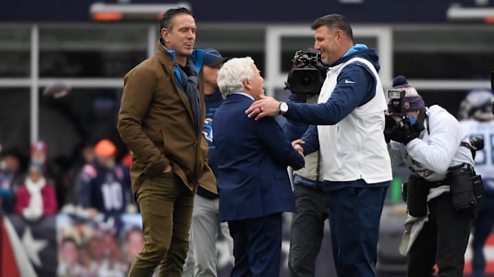 Nov 28, 2021; Foxborough, Massachusetts, USA;  Tennessee Titans head coach Mike Vrabel shakes the hand of New England Patriots owner Robert Kraft while former Patriots quarterback looks on during pregame at Gillette Stadium. Mandatory Credit: Bob DeChiara-Imagn Images