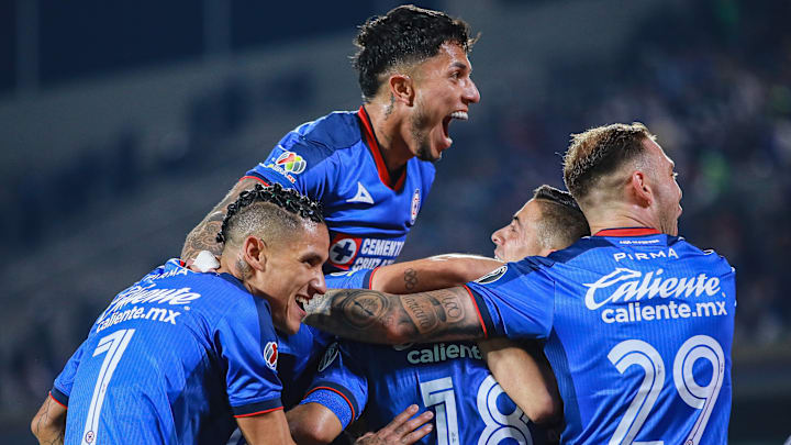 Cruz Azul players celebrate after scoring against UNAM in their Liga MX quarterfinal series. The Cementeros won 2-0.