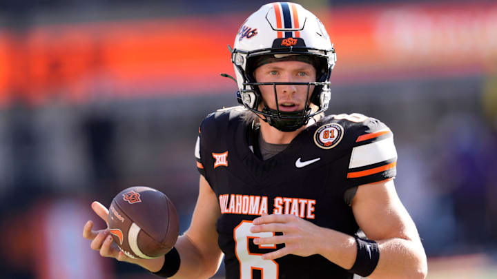 Oklahoma State's Zane Flores (6) warms up before the college football game between Oklahoma State University and the Kansas State Wildcats at Boone Pickens Stadium in Stillwater, Okla., Saturday Nov. 15, 2025.