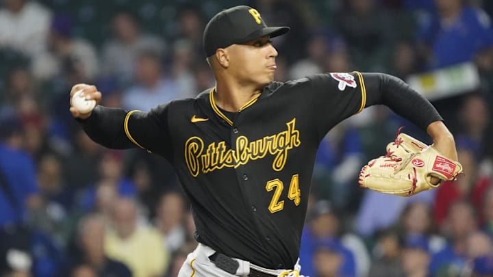 Sep 21, 2023; Chicago, Illinois, USA; Pittsburgh Pirates starting pitcher Johan Oviedo (24) throws the ball against the Chicago Cubs during the first inning at Wrigley Field. Mandatory Credit: David Banks-Imagn Images