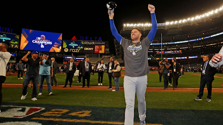 Los Angeles Dodgers first baseman Freddie Freeman (5) celebrates after the Los Angeles Dodgers beat the New York Yankees in game four to win the 2024 MLB World Series at Yankee Stadium.