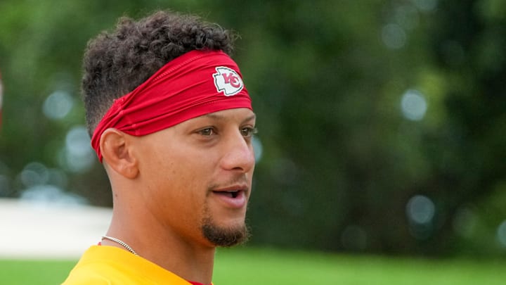 Jul 22, 2025; St. Joseph, MO, USA; Kansas City Chiefs quarterback Patrick Mahomes (15) walks down the hill to the practice fields during training camp at Missouri Western State University. Mandatory Credit: Denny Medley-Imagn Images
