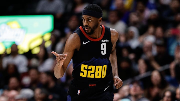 Feb 29, 2024; Denver, Colorado, USA; Denver Nuggets forward Justin Holiday (9) reacts after a play