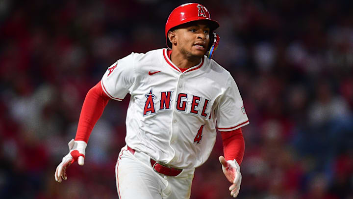Sep 26, 2025; Anaheim, California, USA; Los Angeles Angels second baseman Christian Moore (4) runs after hitting a double against the Houston Astros during the fifth inning at Angel Stadium. Mandatory Credit: Gary A. Vasquez-Imagn Images