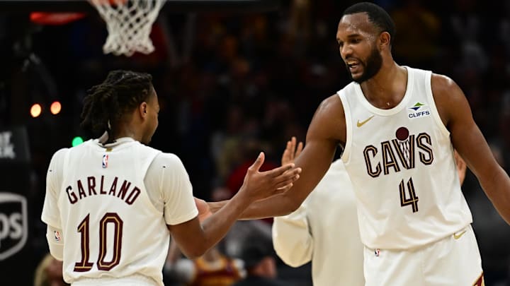 Dec 20, 2024; Cleveland, Ohio, USA; Cleveland Cavaliers guard Darius Garland (10) celebrates with forward Evan Mobley (4) during the second half against the Milwaukee Bucks at Rocket Mortgage FieldHouse. Mandatory Credit: Ken Blaze-Imagn Images