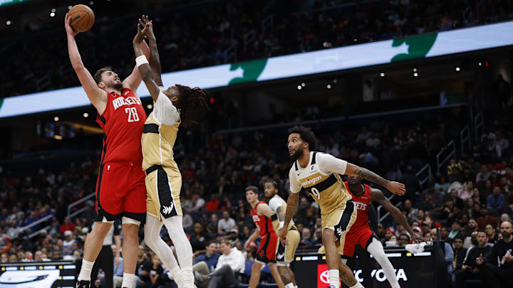 Mar 2, 2026; Washington, District of Columbia, USA; Houston Rockets center Alperen Sengun (28) shoots the ball over Washington Wizards guard Jamir Watkins (5) in the second half at Capital One Arena. Mandatory Credit: Geoff Burke-Imagn Images