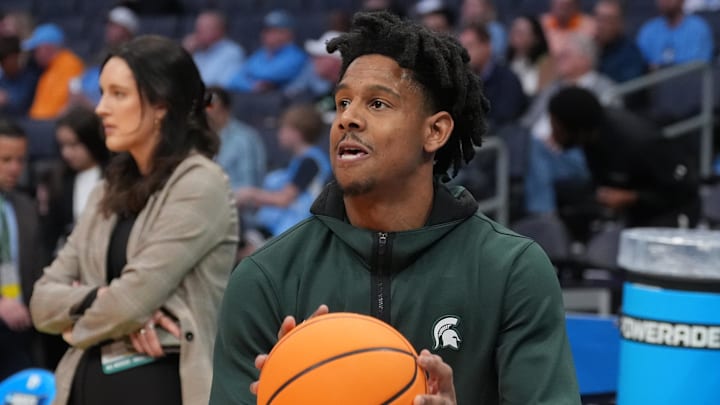 March 23, 2024, Charlotte, NC, USA; Michigan State Spartans guard A.J. Hoggard (11) warms up before