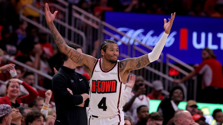 Apr 4, 2025; Houston, Texas, USA; Houston Rockets guard Jalen Green (4) reacts after a made basket against the Oklahoma City Thunder during the fourth quarter at Toyota Center. Mandatory Credit: Erik Williams-Imagn Images