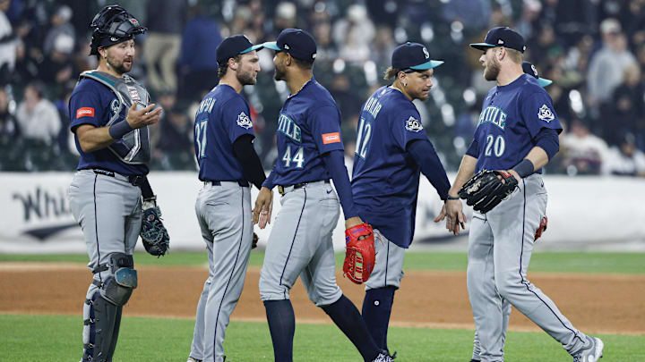 May 8, 2026; Chicago, Illinois, USA; Seattle Mariners right fielder Luke Raley (20) celebrates with teammates after defeating the Chicago White Sox in a baseball game at Rate Field. Mandatory Credit: Kamil Krzaczynski-Imagn Images