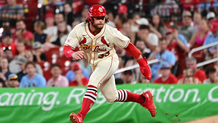 Jul 26, 2025; St. Louis, Missouri, USA;  St. Louis Cardinals second baseman Brendan Donovan (33) takes a big leadoff from first base against the San Diego Padres at Busch Stadium. Mandatory Credit: Tim Vizer-Imagn Images