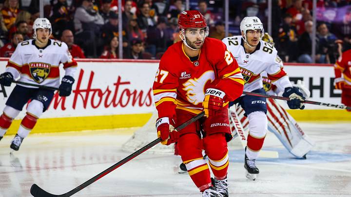 Mar 20, 2026; Calgary, Alberta, CAN; Calgary Flames right wing Matt Coronato (27) skates against the Florida Panthers during the second period at Scotiabank Saddledome. Mandatory Credit: Sergei Belski-Imagn Images