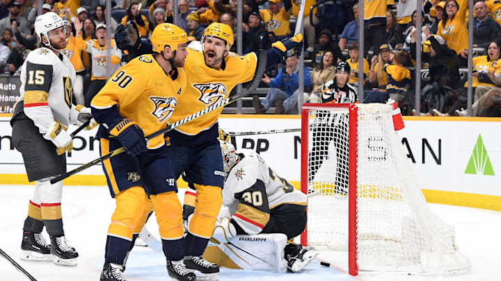 Mar 26, 2024; Nashville, Tennessee, USA; Nashville Predators left wing Filip Forsberg (9) and center