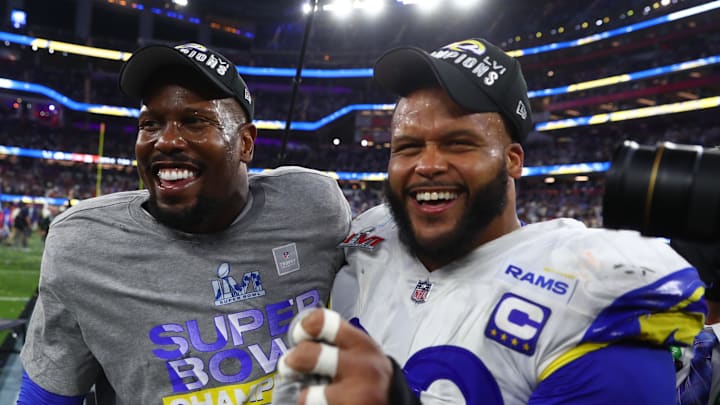 Feb 13, 2022; Inglewood, CA, USA; Los Angeles Rams outside linebacker Von Miller (left) and defensive end Aaron Donald celebrate after defeating the Cincinnati Bengals in Super Bowl LVI at SoFi Stadium. Mandatory Credit: Mark J. Rebilas-Imagn Images