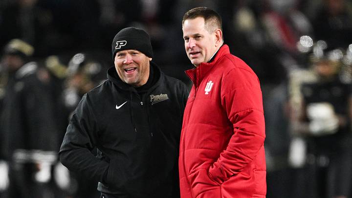 Nov 28, 2025; West Lafayette, Indiana, USA;  Purdue Boilermakers head coach Barry Odom and Indiana Hoosiers head coach Curt Cignetti speak before the game at Ross-Ade Stadium. Mandatory Credit: Marc Lebryk-Imagn Images