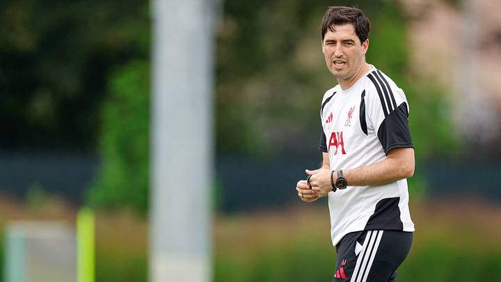 Jul 31, 2026; Chicago, Illinois, USA; Liverpool FC head coach Andoni Iraola walks on the field during a training session at Endeavor Health Performance Center. Mandatory Credit: Kamil Krzaczynski-Imagn Images