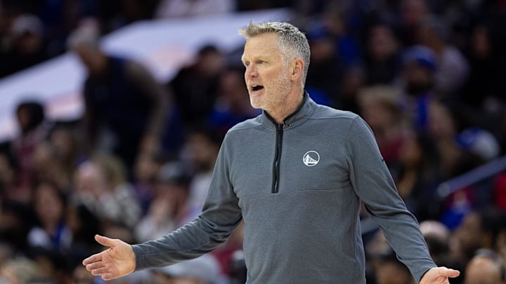 Mar 1, 2025; Philadelphia, Pennsylvania, USA; Golden State Warriors head coach Steve Kerr reacts during the second quarter against the Philadelphia 76ers at Wells Fargo Center. Mandatory Credit: Bill Streicher-Imagn Images