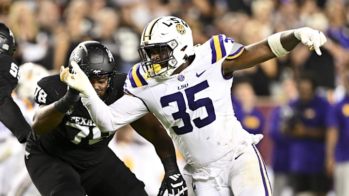 Oct 26, 2024; College Station, Texas, USA; LSU Tigers defensive end Sai'vion Jones (35) defends in coverage during the third quarter against the Texas A&M Aggies. The Aggies defeated the Tigers 38-23; at Kyle Field. Mandatory Credit: Maria Lysaker-Imagn Images.  