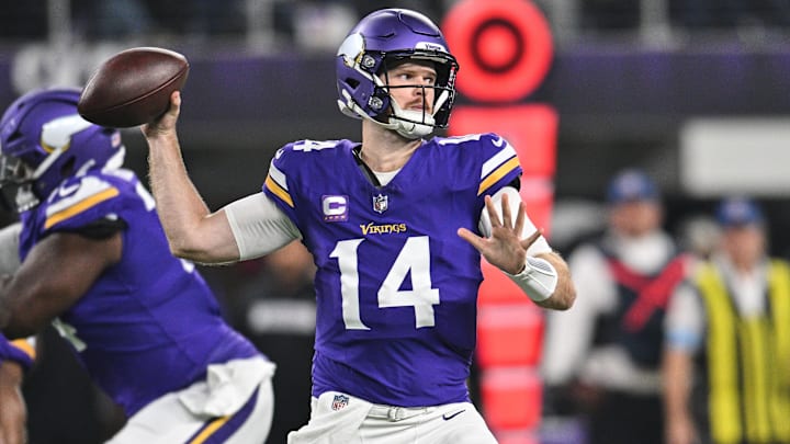 Nov 3, 2024; Minneapolis, Minnesota, USA; Minnesota Vikings quarterback Sam Darnold (14) throws a pass against the Indianapolis Colts during the first quarter at U.S. Bank Stadium. Mandatory Credit: Jeffrey Becker-Imagn Images