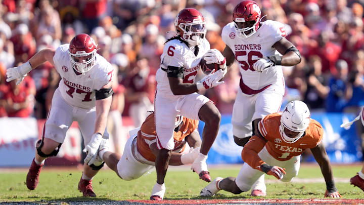 Oklahoma running back Tory Blaylock carries the ball against Texas. Oklahoma running back Tory Blaylock carries the ball against Texas.
