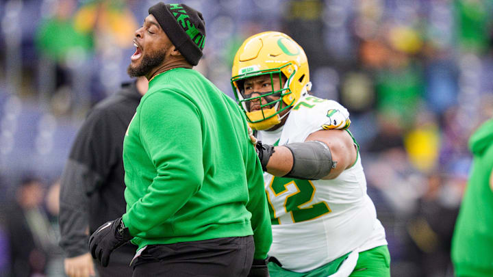 Oregon offensive line coach A'lique Terry rebuilds the the offensive line around Poncho Laloulu, a senior starter at center and a Rimington Award candidate.