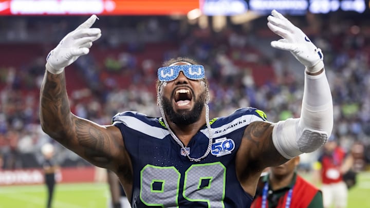 Sep 25, 2025; Glendale, Arizona, USA; Seattle Seahawks defensive end Leonard Williams (99) celebrates after defeating the Arizona Cardinals at State Farm Stadium. Mandatory Credit: Mark J. Rebilas-Imagn Images