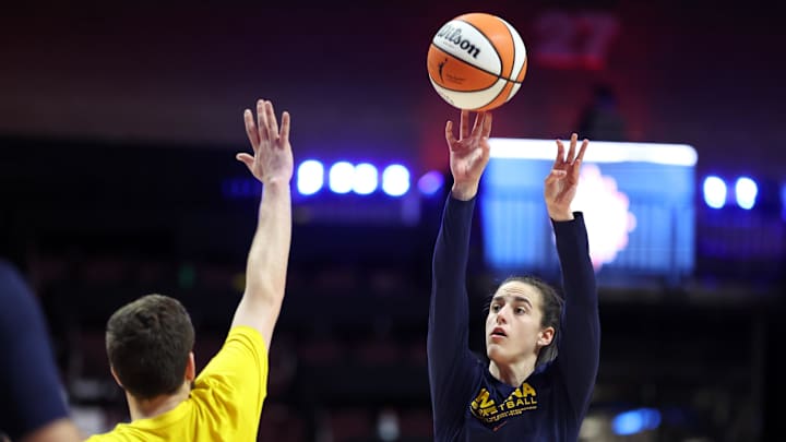 Sep 25, 2024; Uncasville, Connecticut, USA; Indiana Fever guard Caitlin Clark (22) warms up before playing against the Connecticut Sun during game two of the first round of the 2024 WNBA Playoffs at Mohegan Sun Arena. Mandatory Credit: Paul Rutherford-Imagn Images