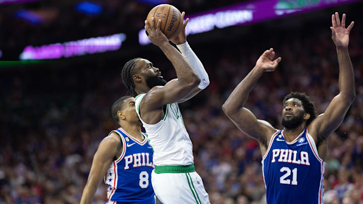 May 11, 2023; Philadelphia, Pennsylvania, USA; Boston Celtics guard Jaylen Brown (7) shoots the ball in front of Philadelphia 76ers center Joel Embiid (21) during the third quarter in game six of the 2023 NBA playoffs at Wells Fargo Center. Mandatory Credit: Bill Streicher-Imagn Images May 11, 2023; Philadelphia, Pennsylvania, USA; Boston Celtics guard Jaylen Brown (7) shoots the ball in front of Philadelphia 76ers center Joel Embiid (21) during the third quarter in game six of the 2023 NBA playoffs at Wells Fargo Center. Mandatory Credit: Bill Streicher-Imagn Images