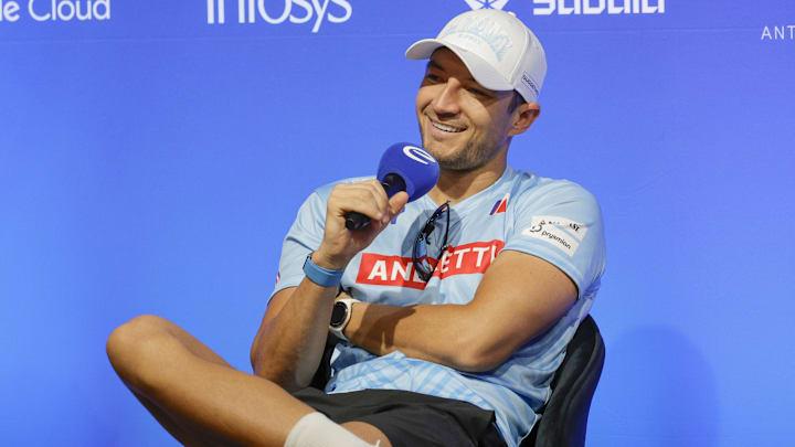 Dennis speaks with the media.