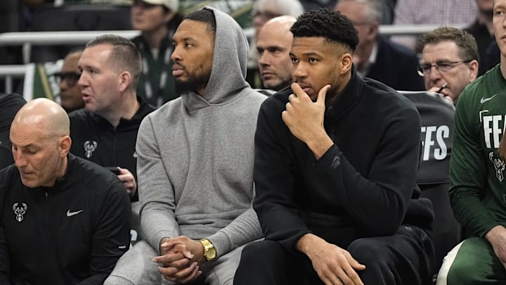 Apr 30, 2024; Milwaukee, Wisconsin, USA; Milwaukee Bucks guard Damian Lillard and forward Giannis Antetokounmpo sit on the bench. Apr 30, 2024; Milwaukee, Wisconsin, USA; Milwaukee Bucks guard Damian Lillard and forward Giannis Antetokounmpo sit on the bench.