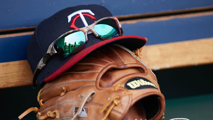 Apr 13, 2017; Detroit, MI, USA; Minnesota Twins hat and glove in the dugout during the game against the Minnesota Twins at Comerica Park. Mandatory Credit: Rick Osentoski-Imagn Images Apr 13, 2017; Detroit, MI, USA; Minnesota Twins hat and glove in the dugout during the game against the Minnesota Twins at Comerica Park. Mandatory Credit: Rick Osentoski-Imagn Images