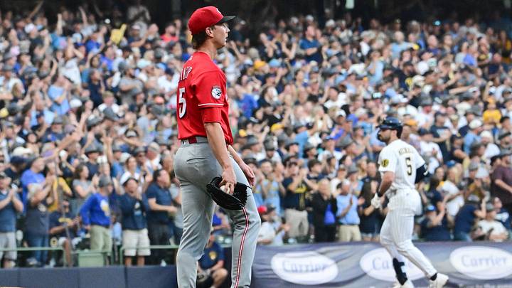 Sep 12, 2026; Milwaukee, Wisconsin, USA; Cincinnati Reds starting pitcher Brady Singer (51) watches Milwaukee Brewers center fielder Garrett Mitchell (5) run the bases after giving up a two run home run in the first inning at American Family Field. Mandatory Credit: Benny Sieu-Imagn Images Sep 12, 2026; Milwaukee, Wisconsin, USA; Cincinnati Reds starting pitcher Brady Singer (51) watches Milwaukee Brewers center fielder Garrett Mitchell (5) run the bases after giving up a two run home run in the first inning at American Family Field. Mandatory Credit: Benny Sieu-Imagn Images