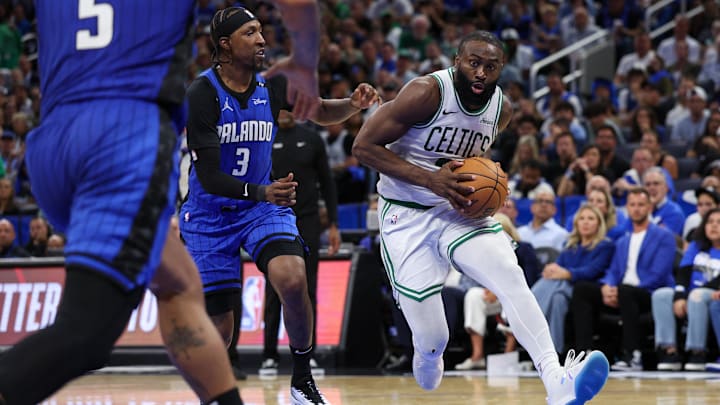 Apr 27, 2025; Orlando, Florida, USA; Boston Celtics guard Jaylen Brown (7) drives to the basket against the Orlando Magic in the fourth quarter during game four of first round for the 2025 NBA Playoffs at Kia Center. Mandatory Credit: Nathan Ray Seebeck-Imagn Images